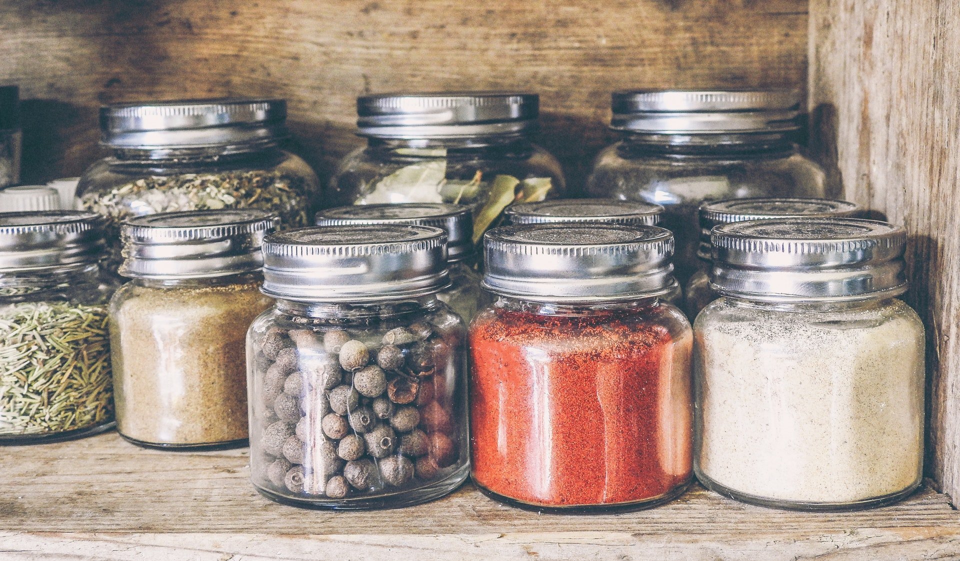Purpose of Salt and Bay Leaves in a Glass spices in jars